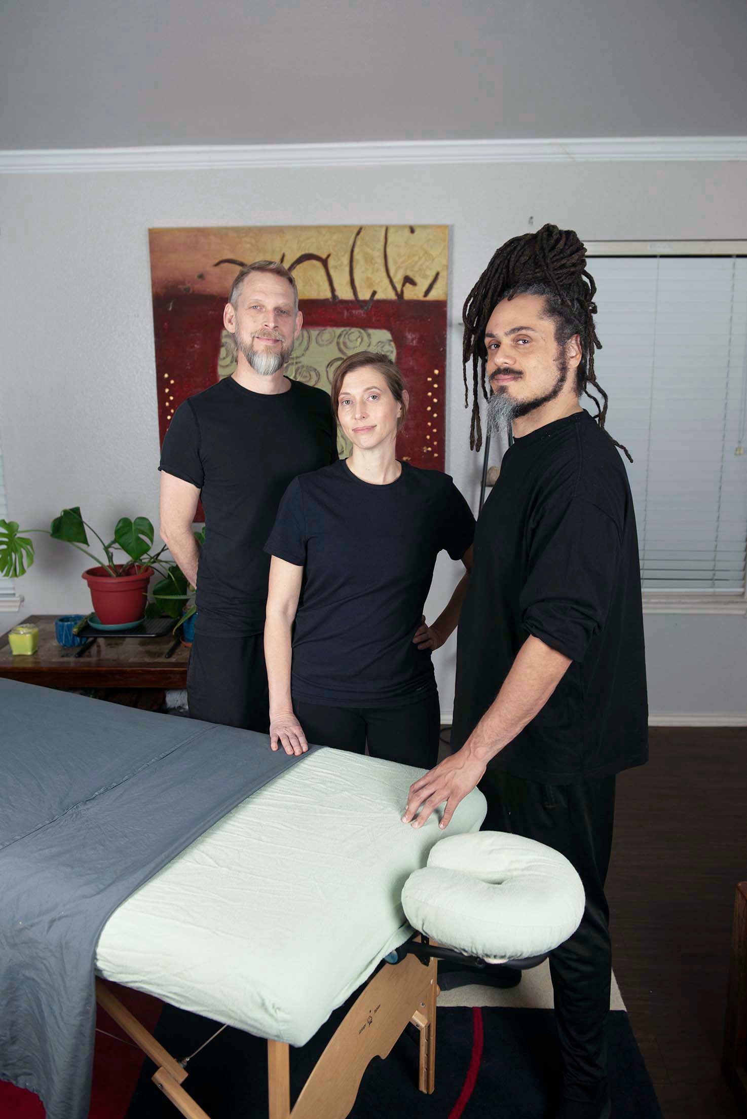 Structural Integration practitioner working slowly through connective tissue in an Austin treatment room